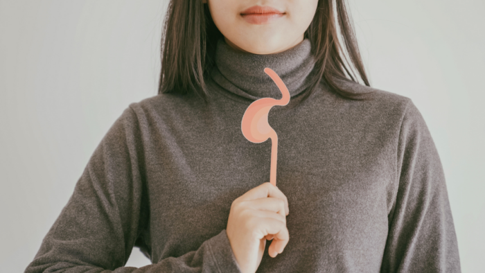 reflujo gastroesofágico | Mujer canva pro